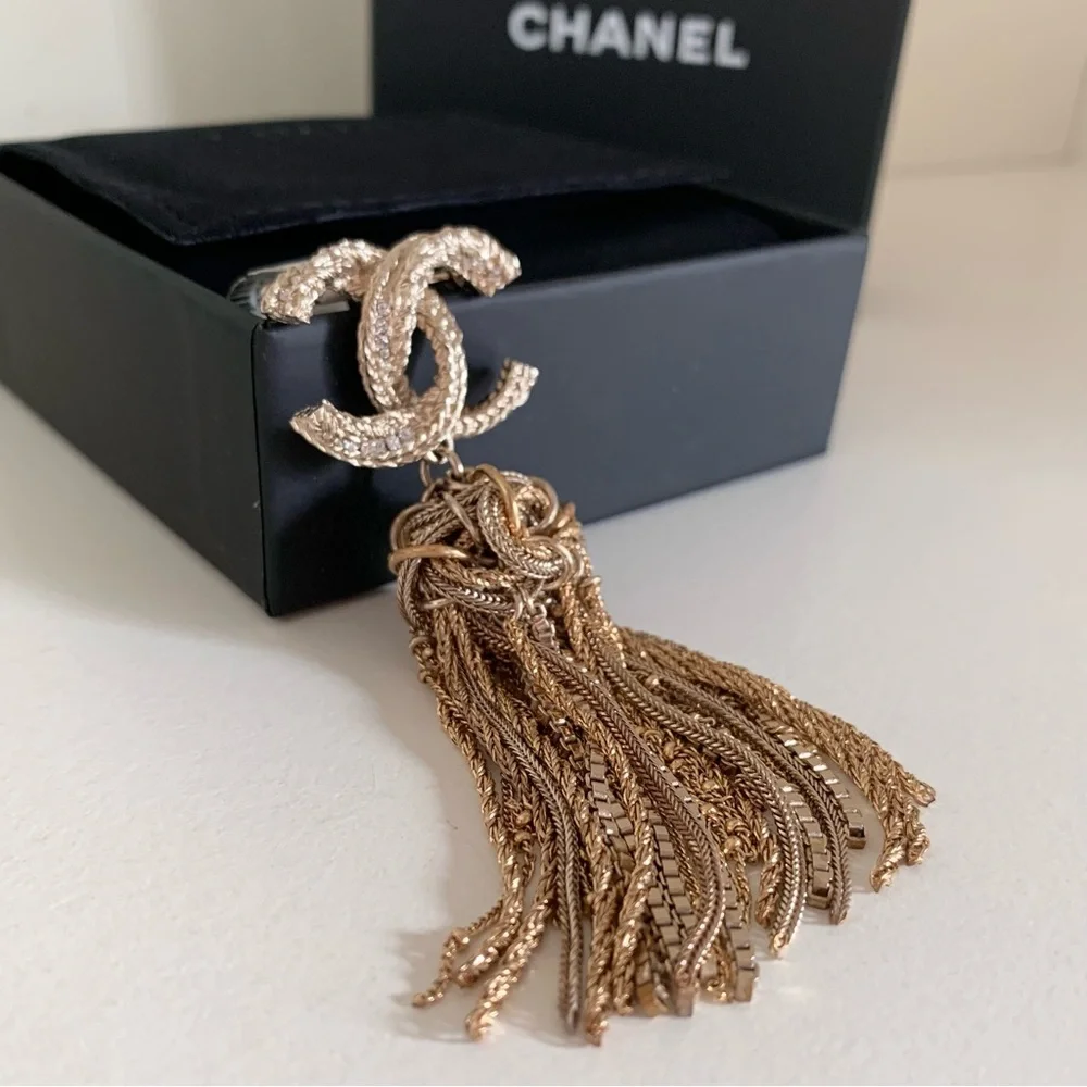 Chanel large tassel brooch in gold with crystals